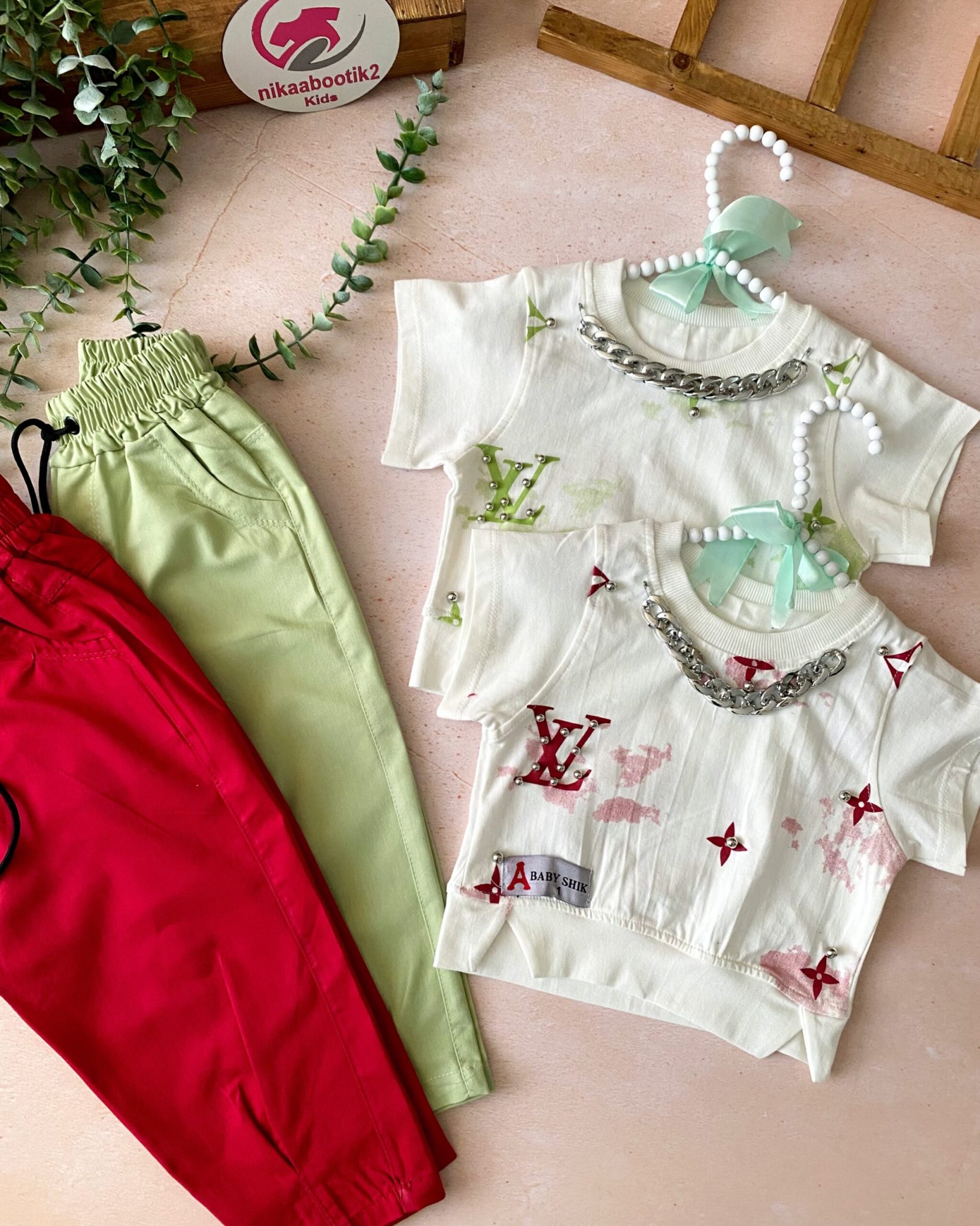 251B01A7-2BB1-404B-8408-23455E307A79 کراپ شلوار LV - Image 1